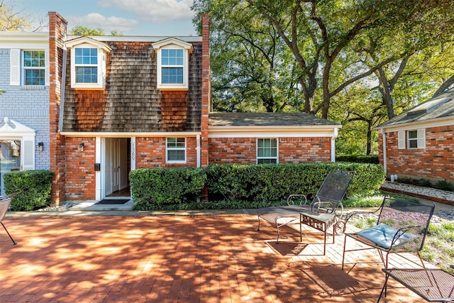 view of front of house featuring a patio