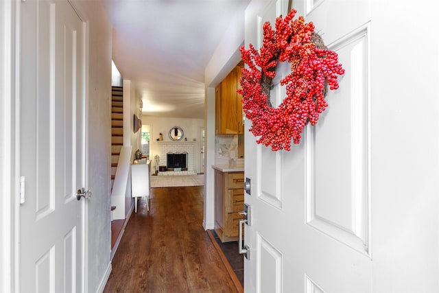 corridor featuring dark hardwood / wood-style flooring