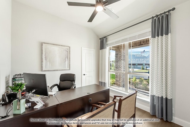 office space featuring hardwood / wood-style flooring, vaulted ceiling, and ceiling fan