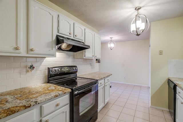 kitchen featuring light tile patterned flooring, white cabinetry, backsplash, hanging light fixtures, and black appliances