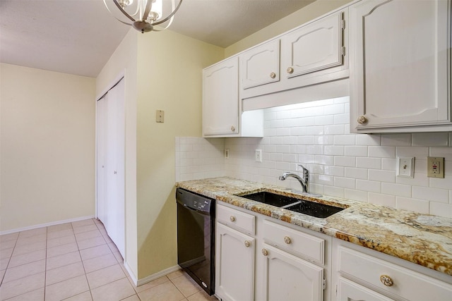 kitchen with white cabinetry, dishwasher, sink, light tile patterned floors, and light stone countertops