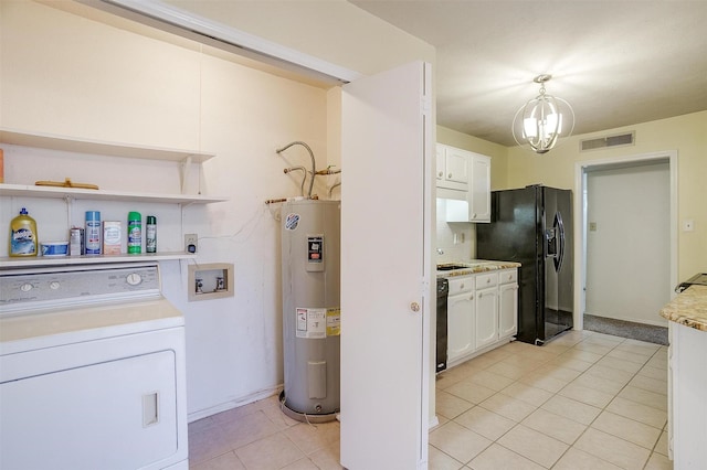 laundry area with light tile patterned flooring, water heater, washer / dryer, sink, and a chandelier