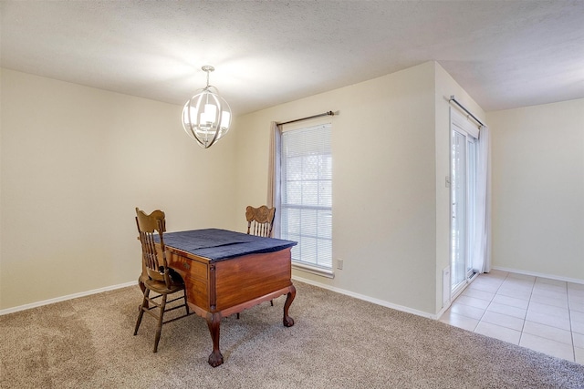 dining space with light colored carpet and a notable chandelier