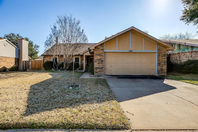 ranch-style home with a garage and a front yard