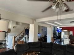 living room with ceiling fan