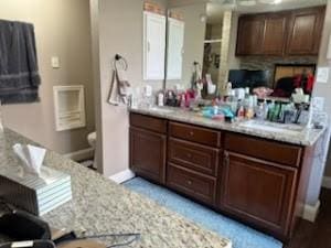 interior space with light stone countertops