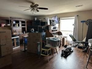 miscellaneous room with ceiling fan and wood-type flooring