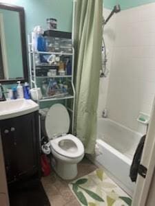 full bathroom with tile patterned floors, toilet, vanity, and shower / tub combo