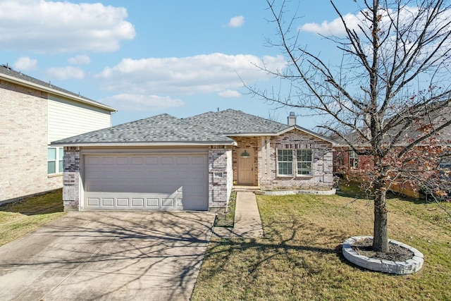 view of front of house with a garage and a front lawn