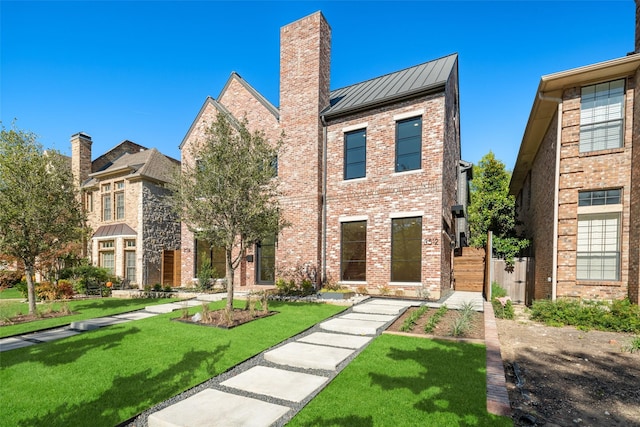 view of front of home with a front yard