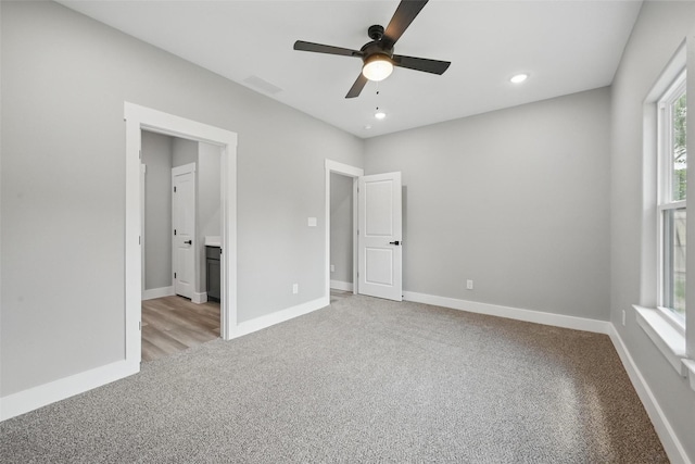 720 W Parnell, Denison, TX 75020 - unfurnished bedroom with light colored carpet, baseboards, recessed lighting, and a ceiling fan
