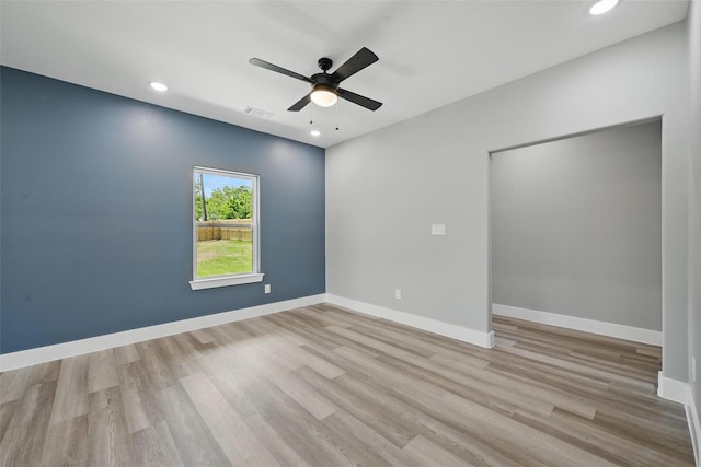 720 W Parnell, Denison, TX 75020 - empty room with wood finished floors, ceiling fan, recessed lighting, and baseboards