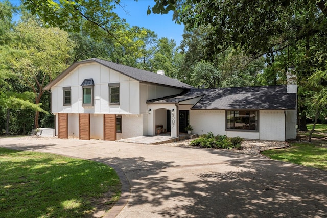 split level home featuring a garage