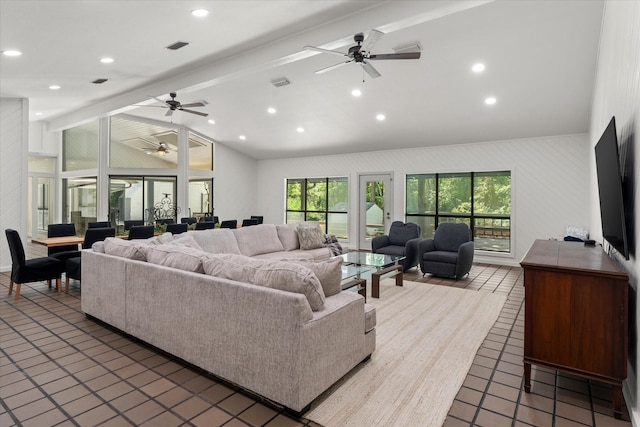 tiled living room with ceiling fan and lofted ceiling with beams