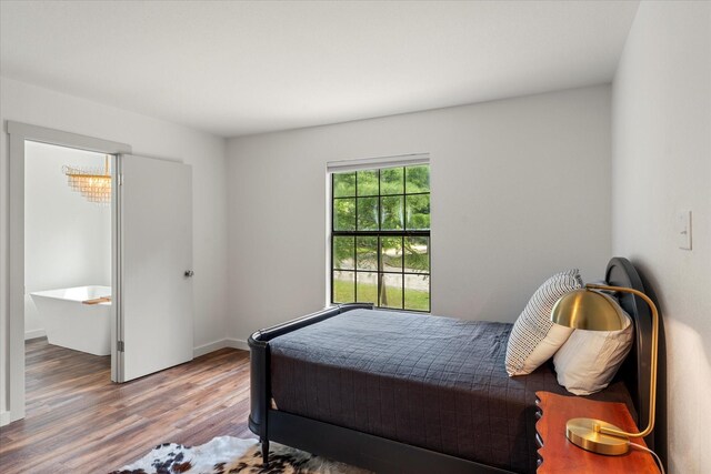 bedroom featuring hardwood / wood-style floors