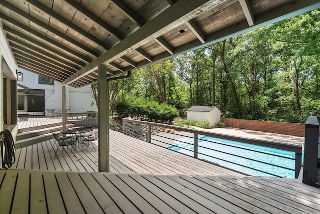 deck featuring a shed