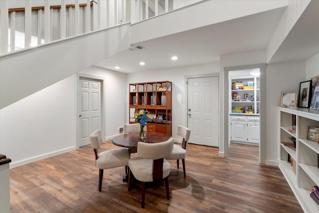 dining area featuring wood-type flooring