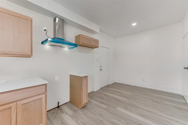 laundry room featuring light wood-type flooring