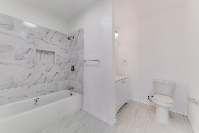 full bathroom featuring vanity, toilet, and tiled shower / bath