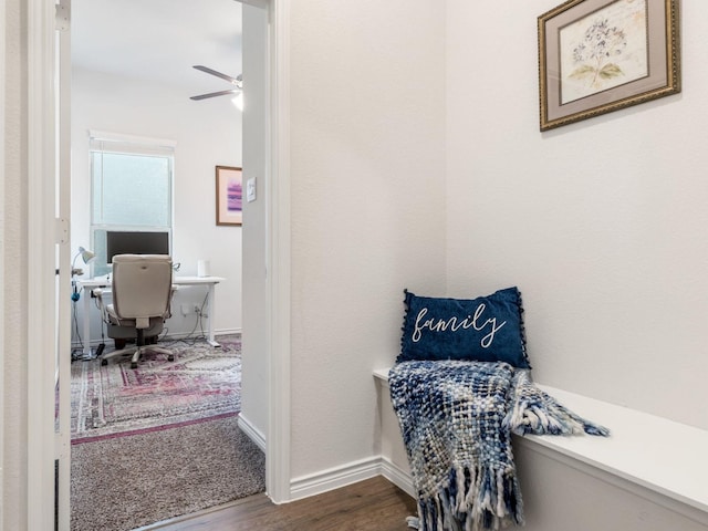 corridor featuring hardwood / wood-style floors