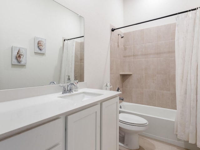 full bathroom featuring vanity, toilet, and shower / bath combo with shower curtain