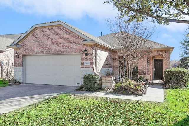 ranch-style house featuring a garage