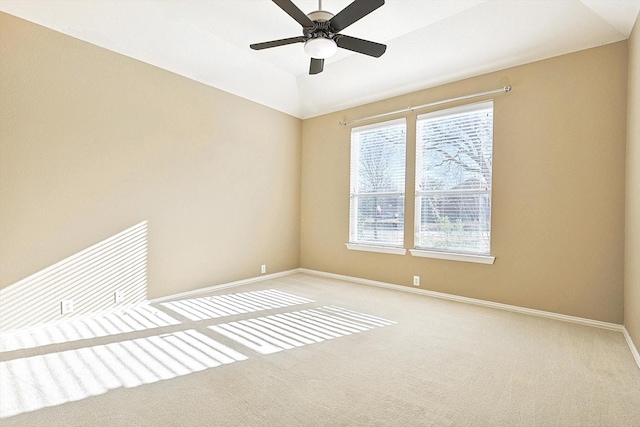 spare room with light carpet, ceiling fan, and lofted ceiling