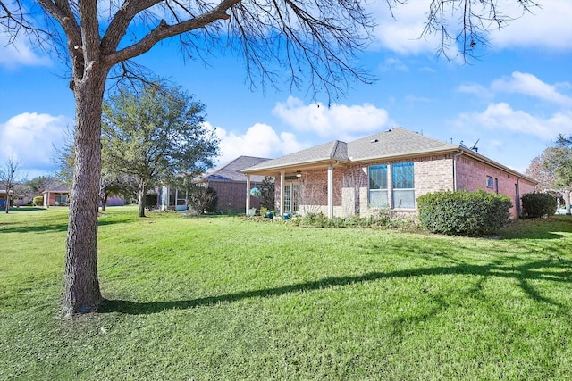 exterior space with a lawn