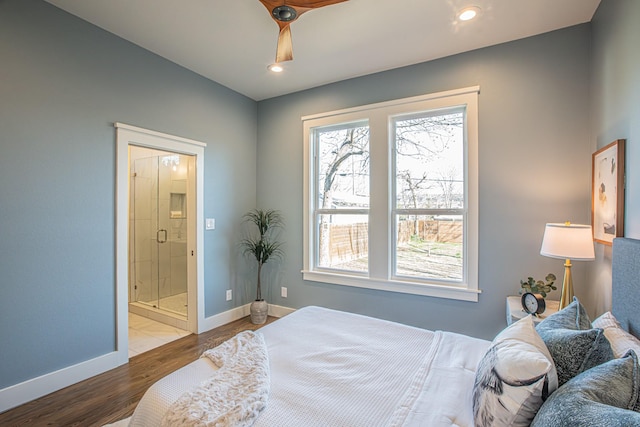 bedroom featuring ceiling fan and light wood-type flooring