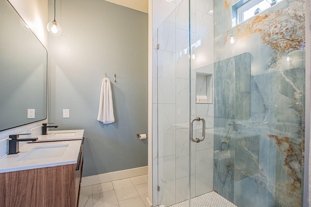 bathroom featuring vanity and an enclosed shower