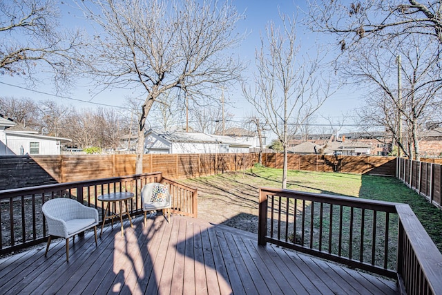 wooden terrace with a yard