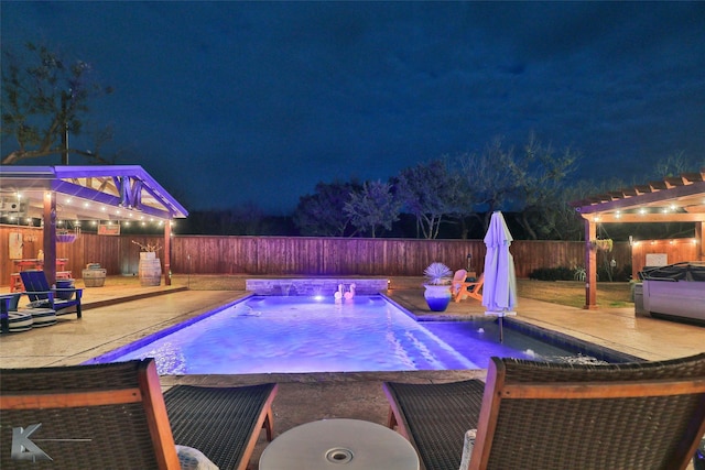 pool at twilight with a pergola and a patio area