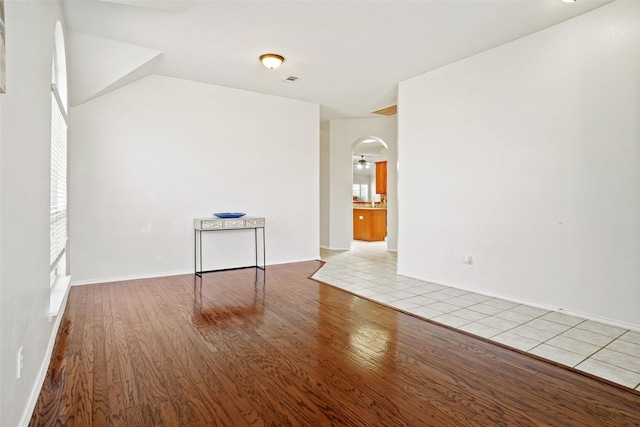 empty room with hardwood / wood-style floors