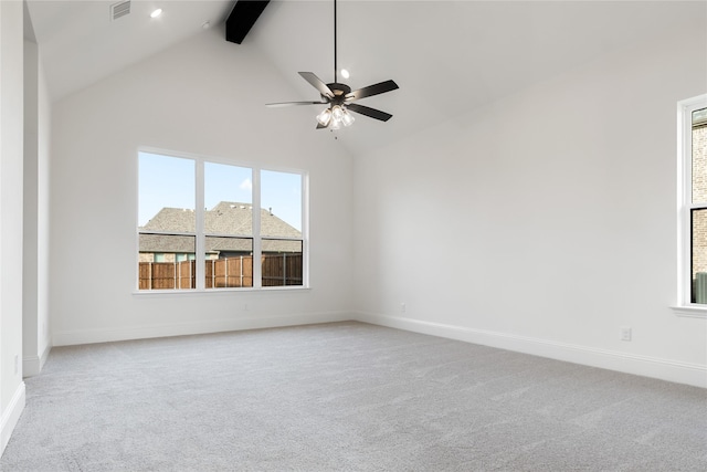 spare room featuring visible vents, light carpet, ceiling fan, beamed ceiling, and baseboards