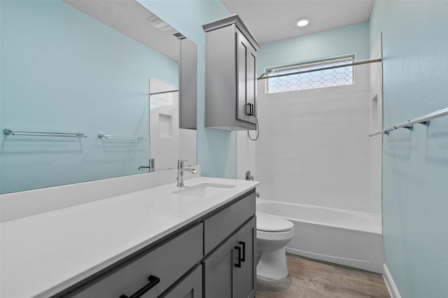 full bathroom featuring vanity, shower / bathtub combination, and toilet