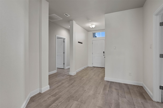 foyer entrance featuring light wood-type flooring