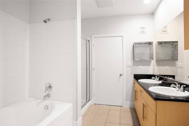 bathroom with tile patterned floors and vanity