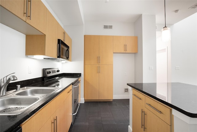 kitchen with sink, dark tile patterned floors, pendant lighting, stainless steel electric range, and light brown cabinetry