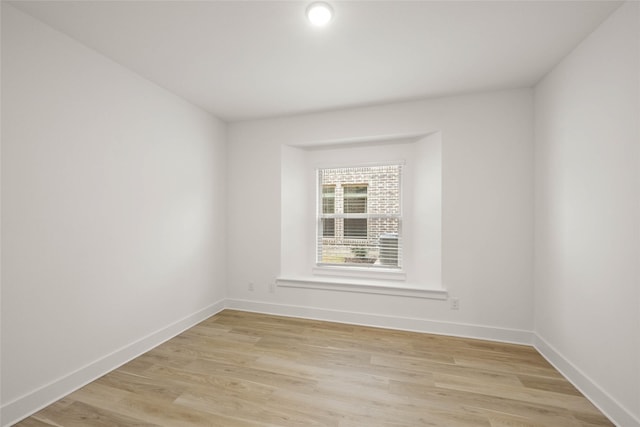 empty room with light wood-type flooring