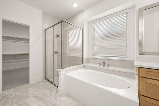 bathroom with plus walk in shower