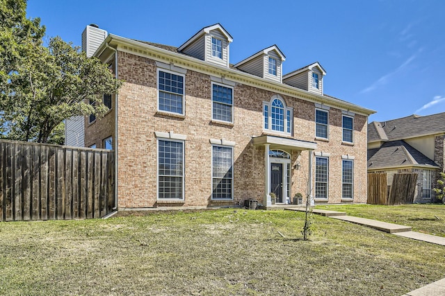 view of front of property with a front lawn