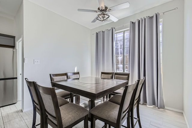 dining area featuring ceiling fan