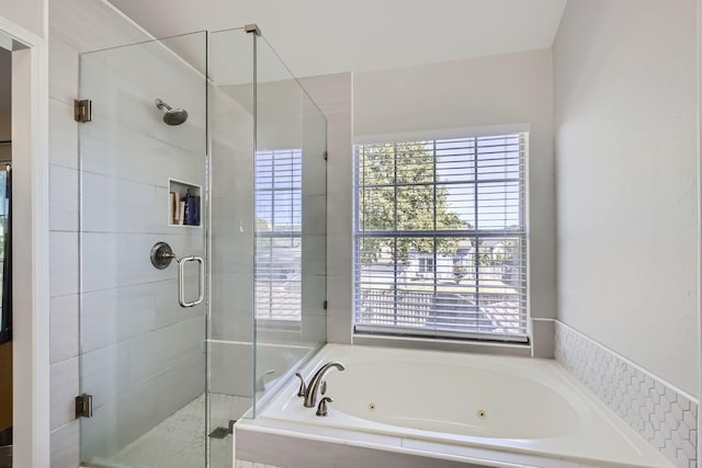 bathroom featuring plus walk in shower