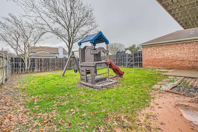 view of yard with a playground