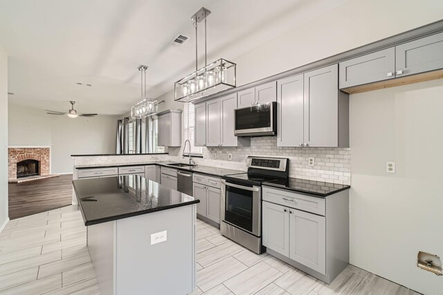 dining space with dark hardwood / wood-style flooring and plenty of natural light