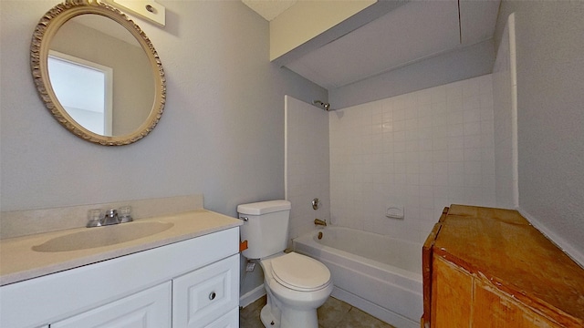 full bathroom featuring tile patterned flooring, vanity, toilet, and tiled shower / bath combo