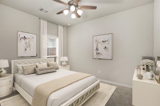 bedroom with light carpet and ceiling fan