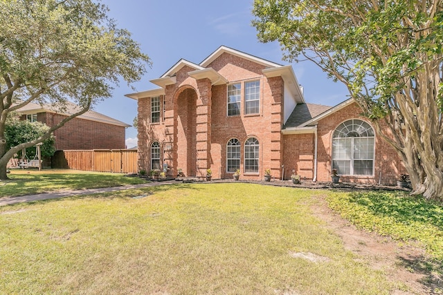 view of property with a front lawn