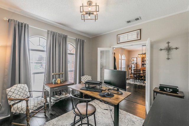 office area featuring a notable chandelier, dark hardwood / wood-style flooring, plenty of natural light, and a textured ceiling