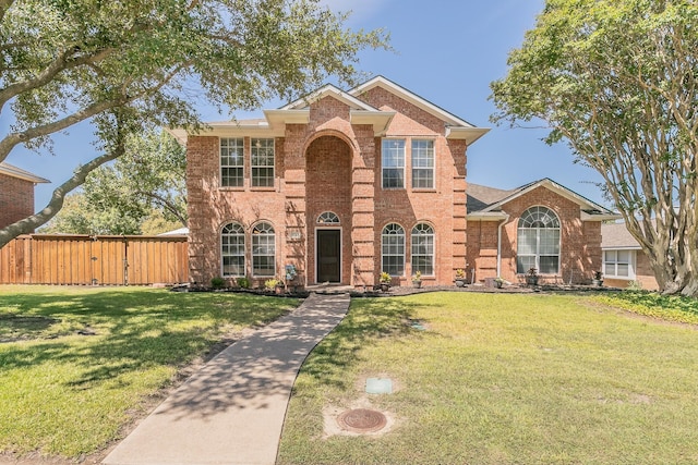 view of front facade with a front yard